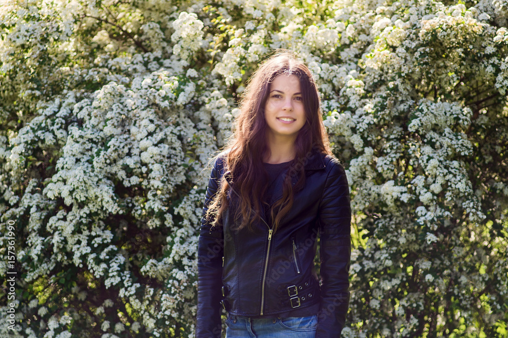 Young beautiful girl in a black jacket Young beautiful girl in a black jacket