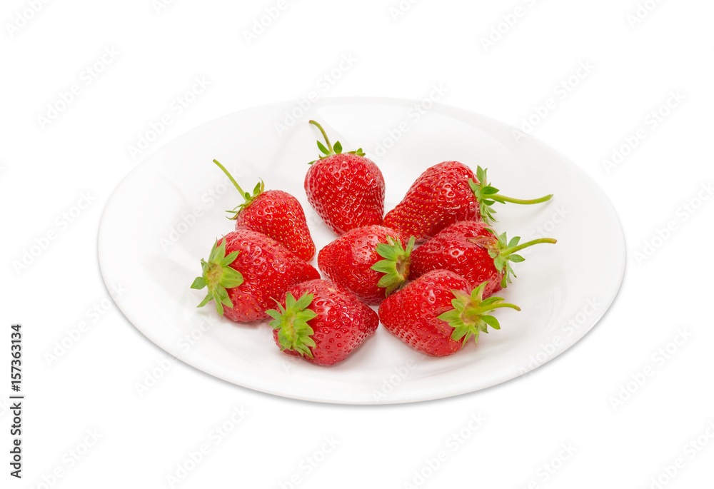 Garden strawberry fruits on the white dish Garden strawberry fruits on the white dish