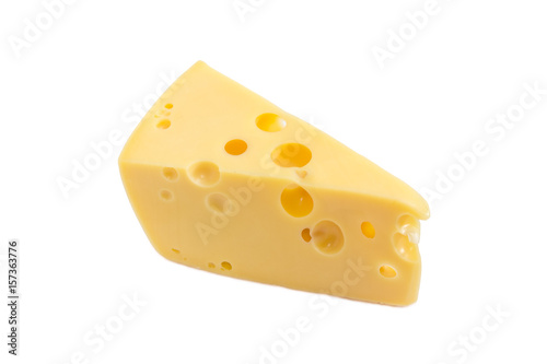 Piece of Swiss-type cheese on a light background