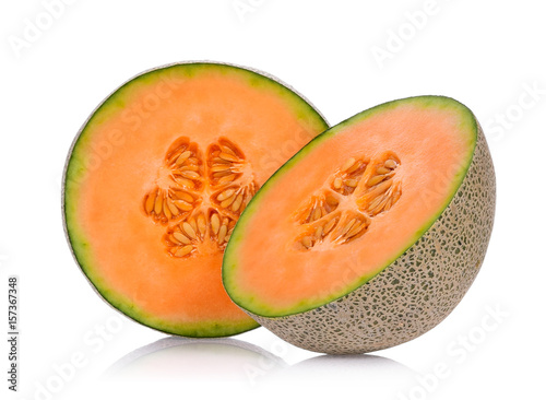 Half of fresh cantaloupe melon fruit isolated on white background.