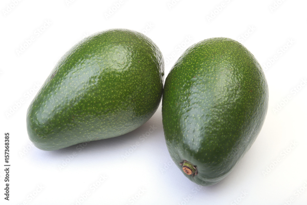 Fresh, green Avocado isolated on a white background. Fresh, green Avocado isolated on a white background.