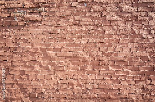 Old grungy red brick wall, frontal flat background