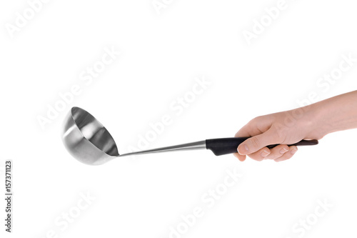 Woman holding soup ladle for cooking classes on white background