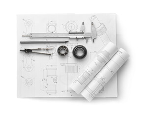 Engineering supplies and part blueprints on white background
