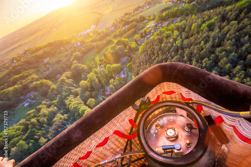 A hot air baloon rising hig...