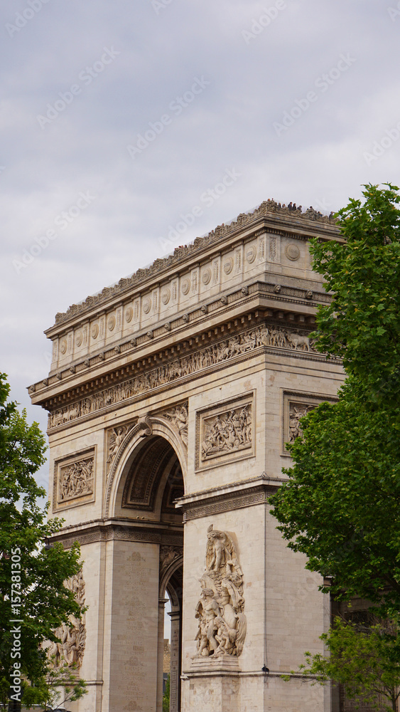 Photo of Arc de Triomphe on a cloudy spring morning, Paris, France Photo of Arc de Triomphe on a cloudy spring morning, Paris, France