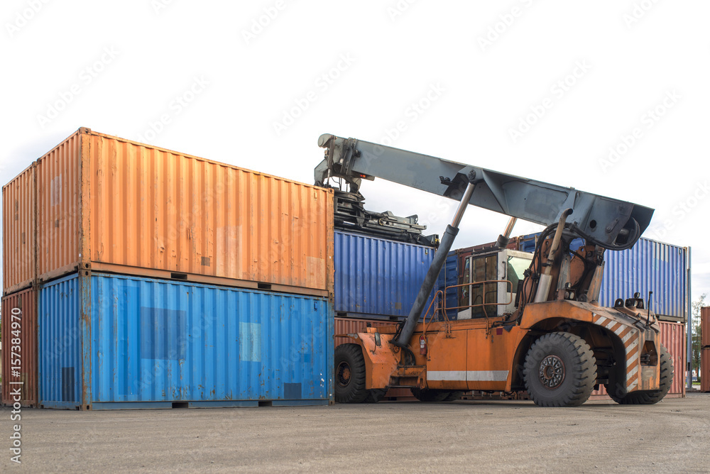 Forklift handling container box loading at port cargo white background