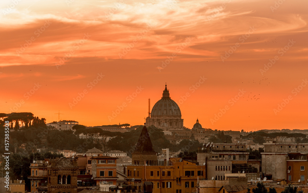 red sunset on Rome. St Peter dome silhouette
