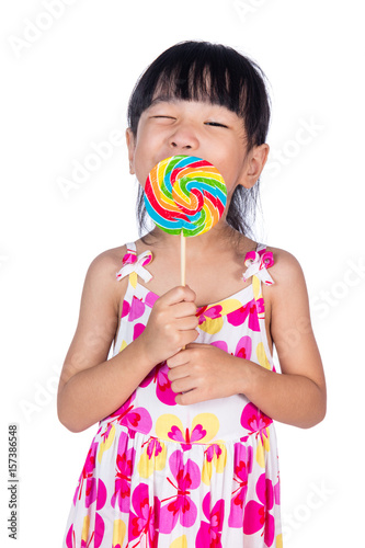 Asian Little Chinese girl eating lollipop © Tan Kian Khoon