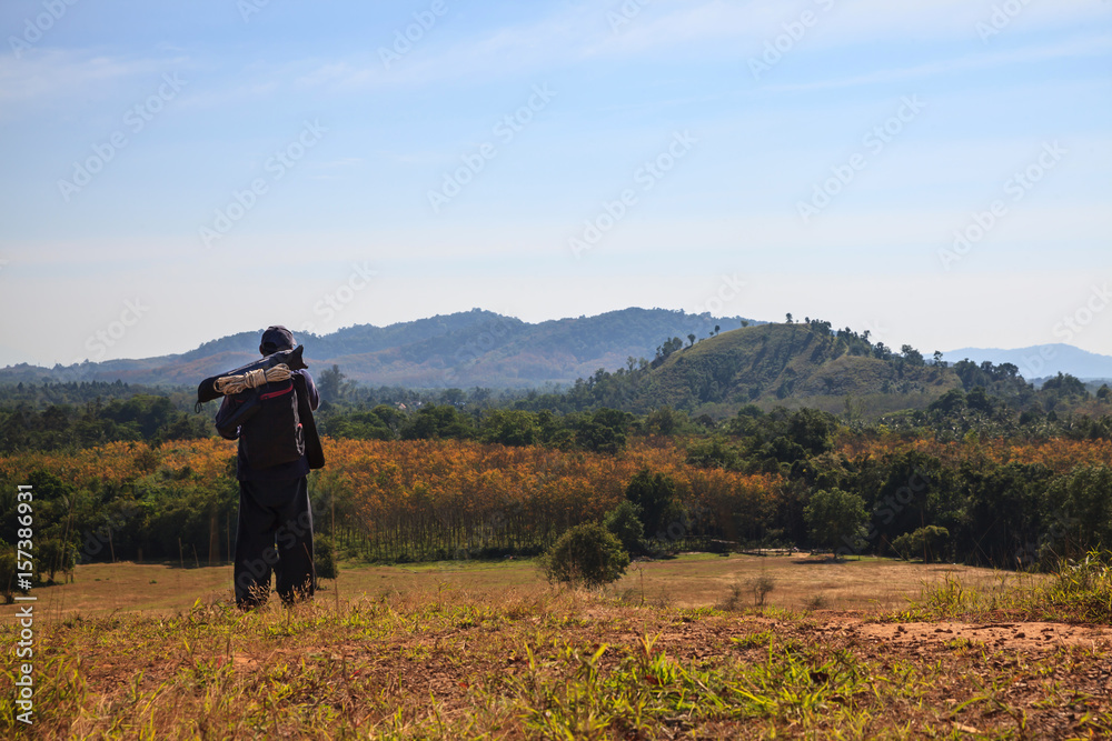Man traveler with backpack hiking travel on the mountains. Man traveler with backpack hiking travel on the mountains.