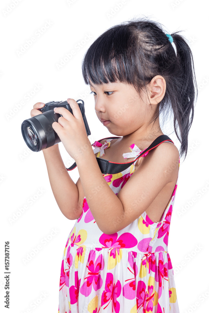 Asian Little Chinese girl holding a camera