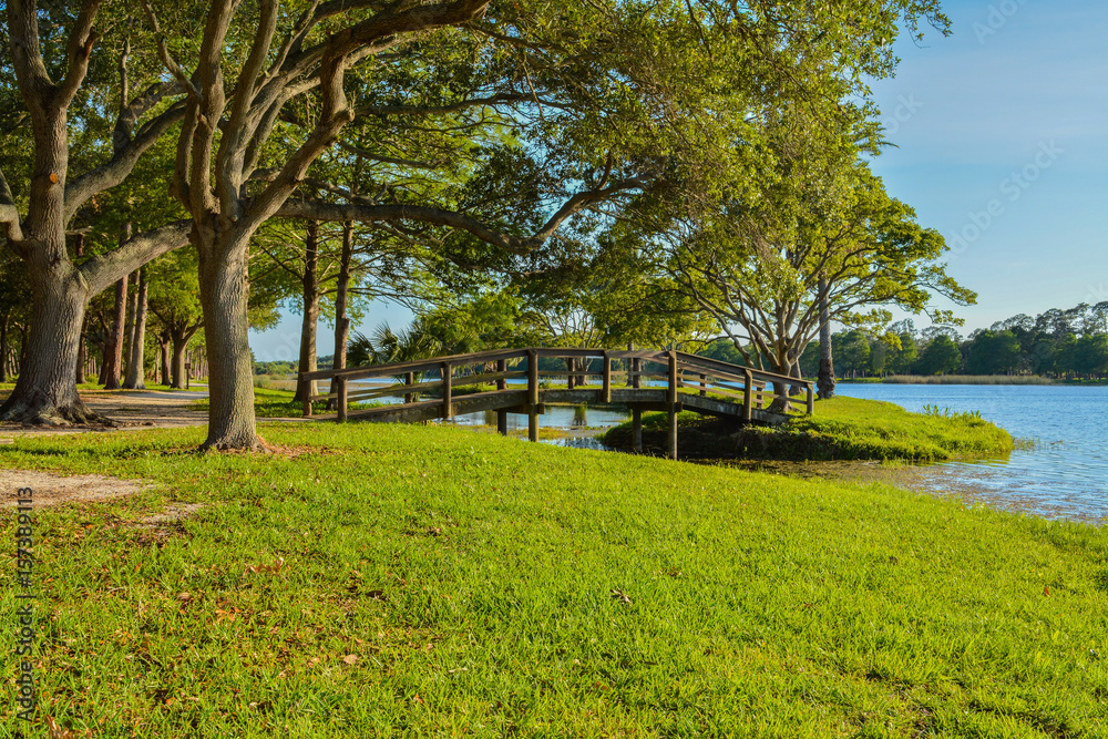 A beautiful day for a walk and the view of the wood bridge to the island at John S. Taylor Park in Largo, Florida.