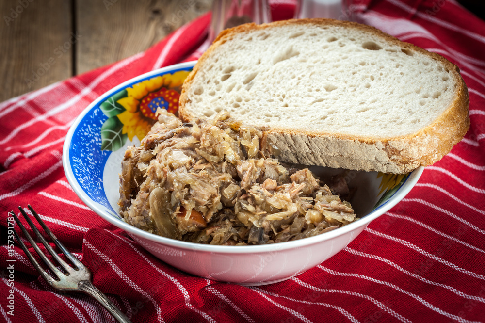 Traditional polish sauerkraut (bigos) with mushrooms and meat. Traditional polish sauerkraut (bigos) with mushrooms and meat.