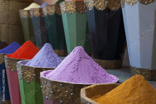 Pigment and dyes at a local, traditional market, also known as souk at the Medinas, Marrakesh, Morocco photo