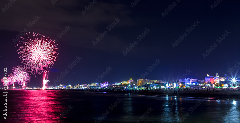 Night fireworks explosion on seafront. Rimini Night fireworks explosion on seafront. Rimini