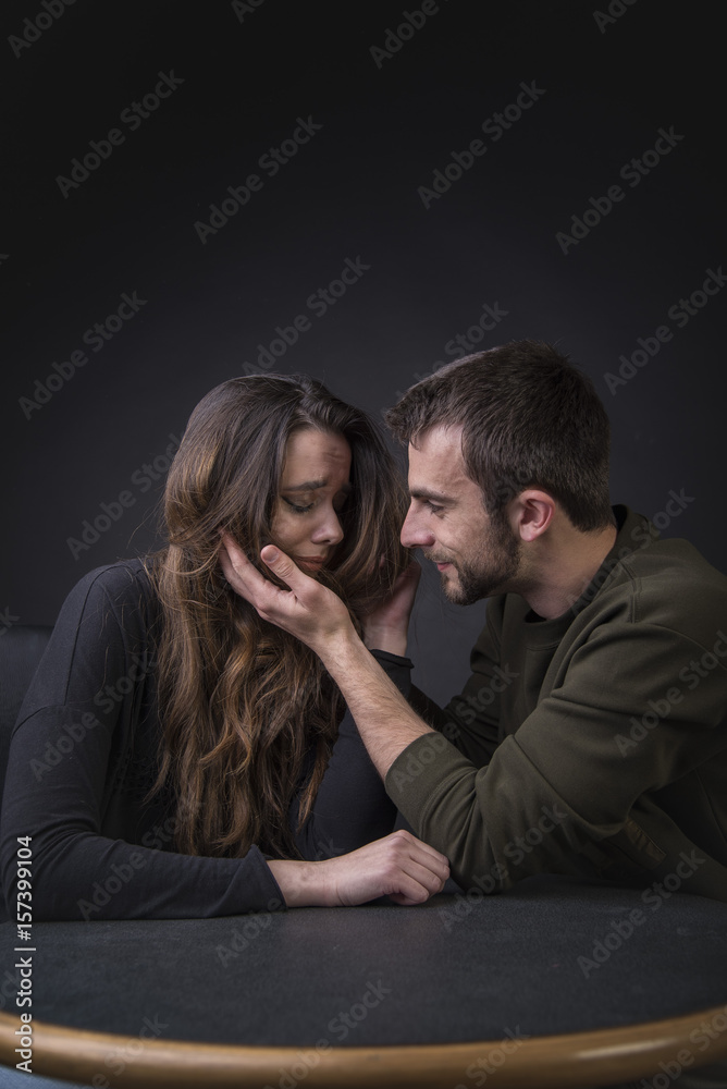 Man Comforting Woman