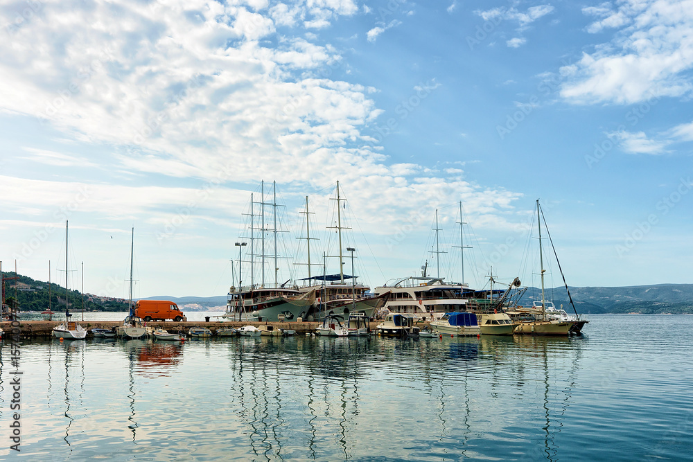 Sailboats at harbor in Adriatic Sea in Omis