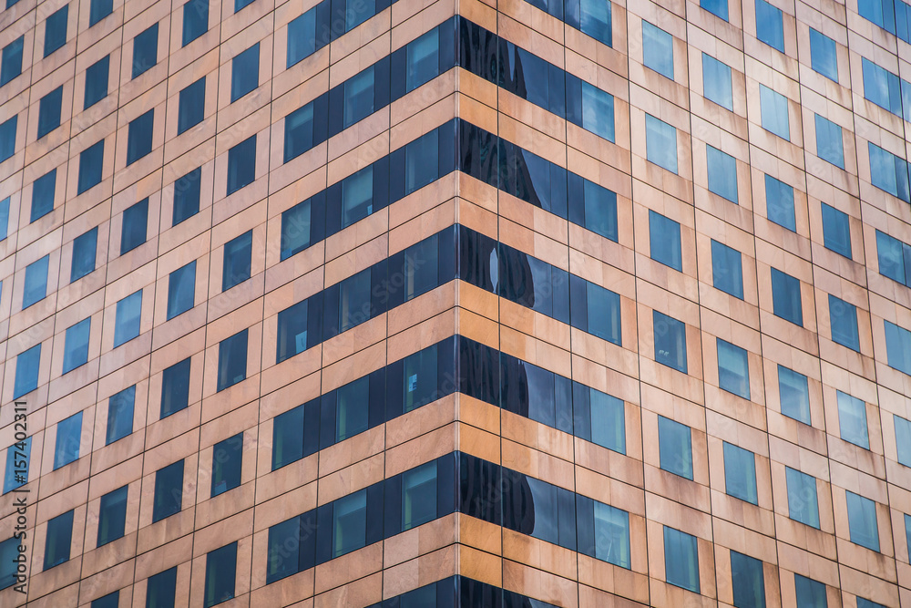 Modern blue glass wall of skyscraper. Business building, office center. Abstract architecture, fragment of modern urban geometry. Background lines Modern blue glass wall of skyscraper. Business building, office center. Abstract architecture, fragment of modern urban geometry. Background lines