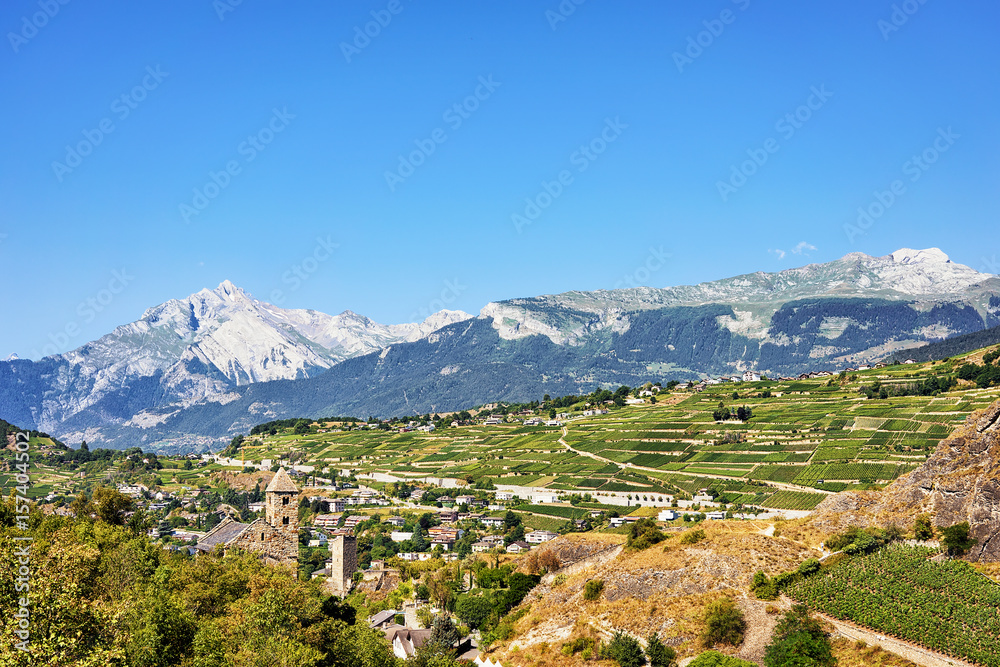 Sion cityscape and valley and Bernese Alps mountains Valais Switzerland