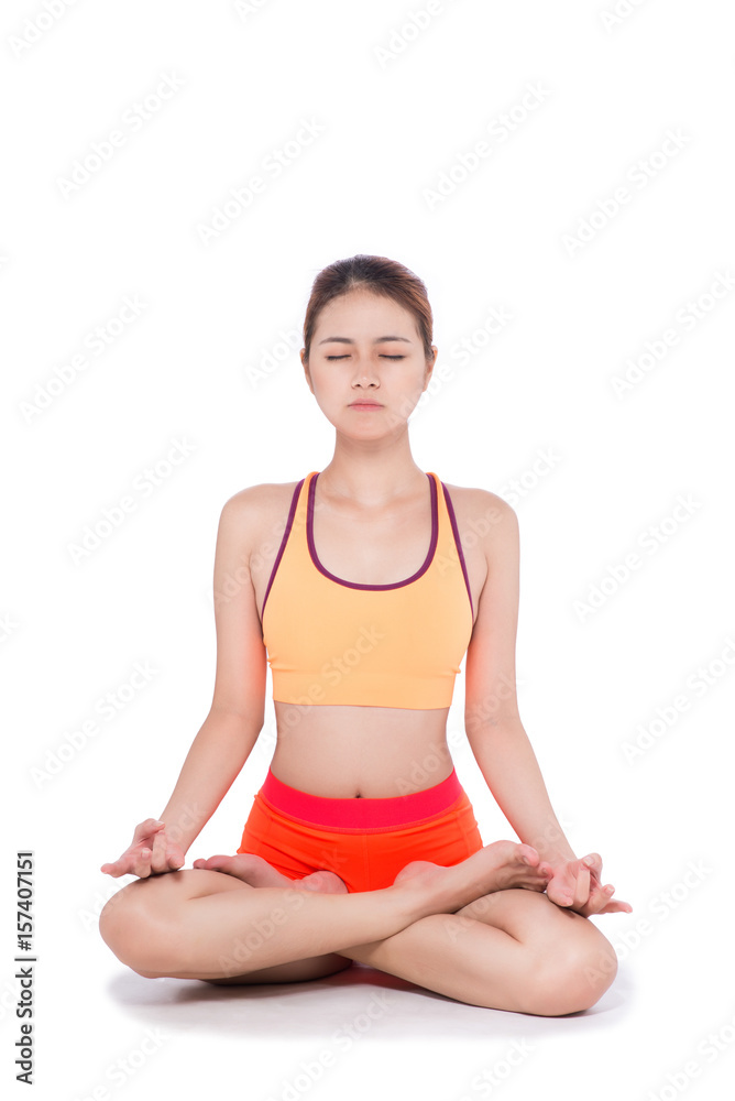Young woman sitting in lotus position on white. Young woman sitting in lotus position on white.