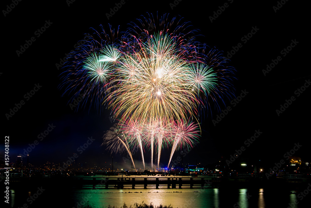 Fireworks display on dark sky background. Fireworks display on dark sky background.