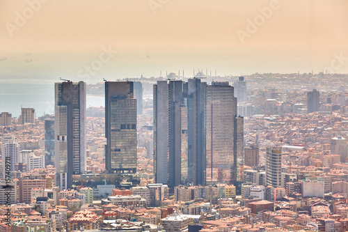 Urban landscape of European side of Istanbul and Bosphorus Strait on a horizon. Modern part of city with business towers of international corporations, skyscrapers and shopping malls of the city