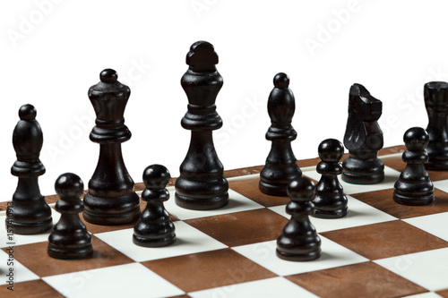 Chess board with wooden chess pieces