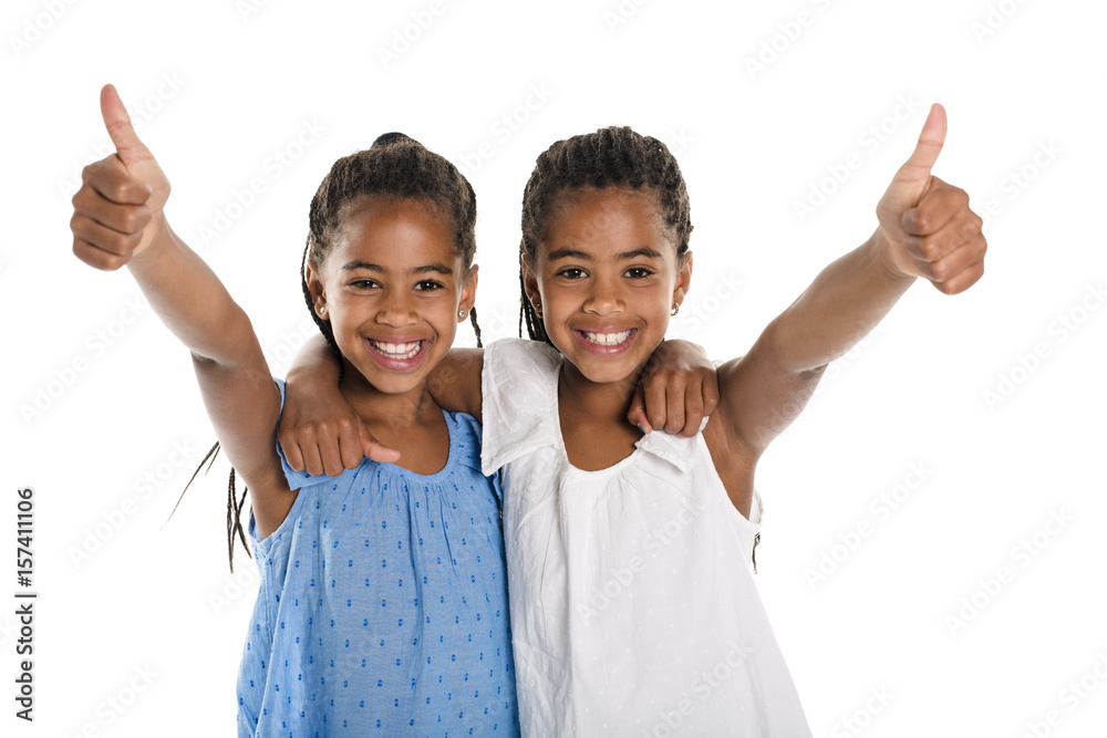 Two Adorable african twin girl on studio white background Two Adorable african twin girl on studio white background