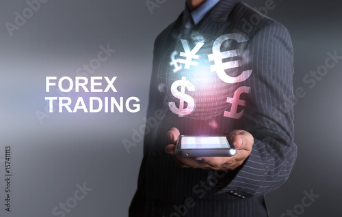 Businessman holding smart phone world of currency forex trading with one hand photo