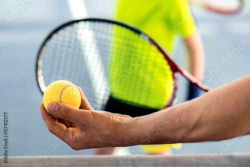 Skillful sportsman playing tennis on court © Yakobchuk Olena