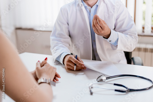 Doctor explaining for patient at consulting room