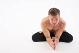 Yoga. The lotus position. Sexy man and a healthy lifestyle. Sport and strength. 