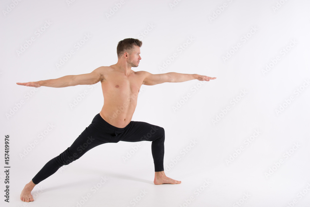 Flexibility. Fitness and healthy lifestyle. Sexy man and a healthy lifestyle. Sport and strength. Flexibility. Fitness and healthy lifestyle. Sexy man and a healthy lifestyle. Sport and strength.