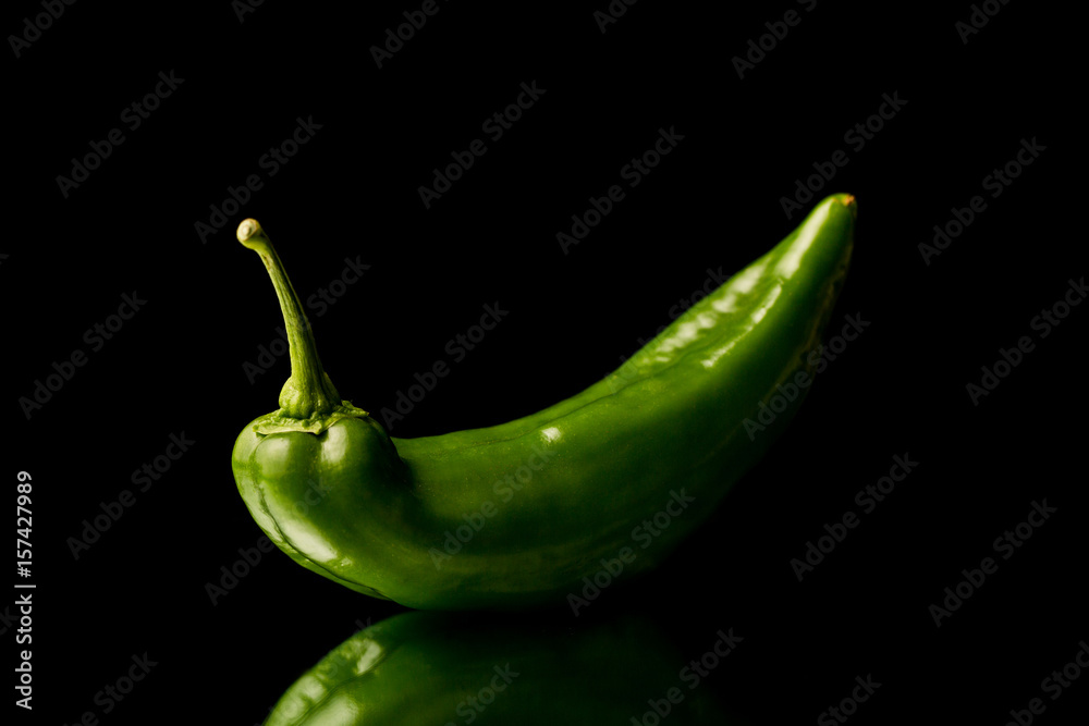 Green peppers isolated on black Green peppers isolated on black