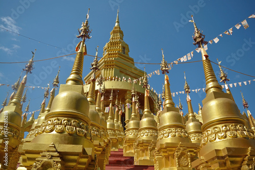 Beautiful view of many golden pagoda in the temple in Thailand