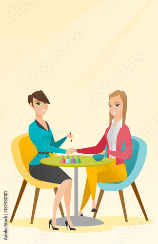 Woman receiving manicure in nail salon.