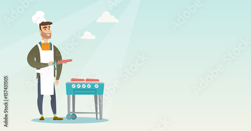 Man cooking steak on barbecue grill.