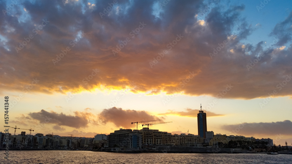 Fototapeta premium Sunset over San Giljan, Malta