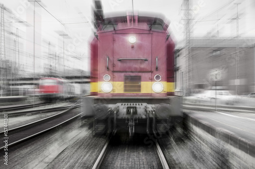 train speeding in color