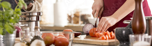 Woman cutting vegetables