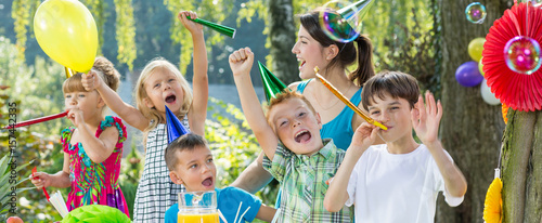 Kids celebrating their friend's birthday