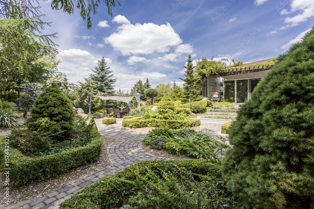 Large garden with decorative stone paths