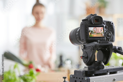 Camera filming a cook photo