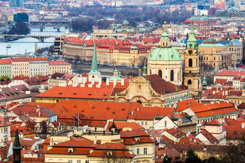 Panorama of the city Prague. Red tiled roofs of the houses in the old part of the city. Aerial view