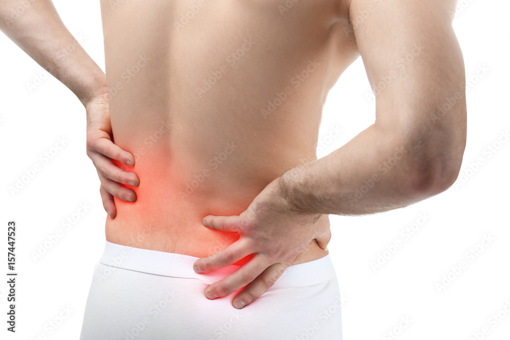 Concept of orthopedist. Man suffering from pain in back on white background Concept of orthopedist. Man suffering from pain in back on white background