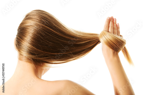 Long blond human hair close-up.