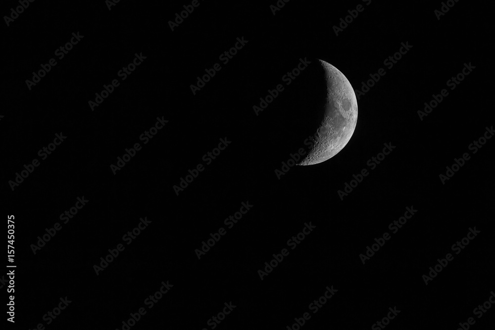 Nice mystical half moon on dark night sky background Nice mystical half moon on dark night sky background