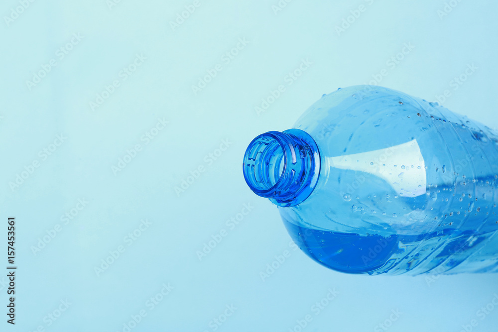 Plastic bottle with water on color background Plastic bottle with water on color background