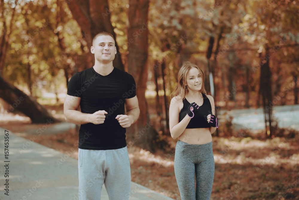 man and woman in park