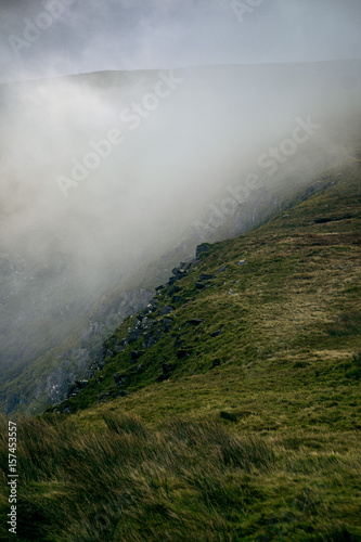 Fog rising up upon the hill